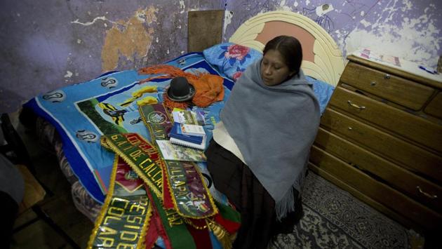 Callapa Councilwoman Monica Paye, who is under house arrest, sits next to her official sashes in La Paz. Paye was arrested and suspended in May when officials accused her of losing two city-owned laptops, even though she offered to replace them. Paye, 34, had feuded with the mayor over public works contracts in the town. (Juan Karita / AP) Callapa Councilwoman Monica Paye, who is under house arrest, sits next to her official sashes in La Paz. Paye was arrested and suspended in May when officials accused her of losing two city-owned laptops, even though she offered to replace them. Paye, 34, had feuded with the mayor over public works contracts in the town. (Juan Karita / AP)