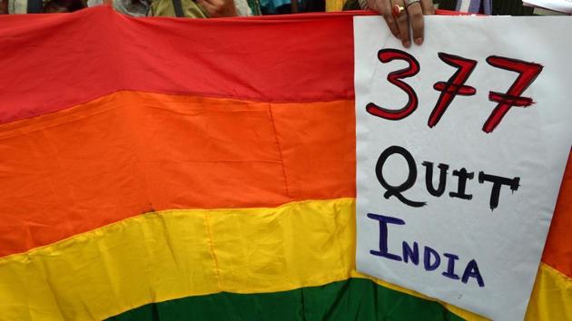 A gay rights activist holds up a placard against Section 377 as they take part in a protest against the Supreme Court ruling reinstating a ban on gay sex, in Kolkata on December 15, 2013. (AFP Photo) A gay rights activist holds up a placard against Section 377 as they take part in a protest against the Supreme Court ruling reinstating a ban on gay sex, in Kolkata on December 15, 2013. (AFP Photo)