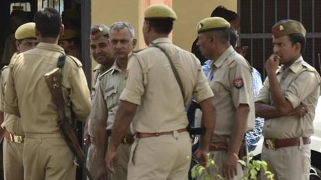 The woman was taken to the district hospital by the police. Her family members attacked the police van and took here away in a vehicle. (HT File Photo) The woman was taken to the district hospital by the police. Her family members attacked the police van and took here away in a vehicle. (HT File Photo)