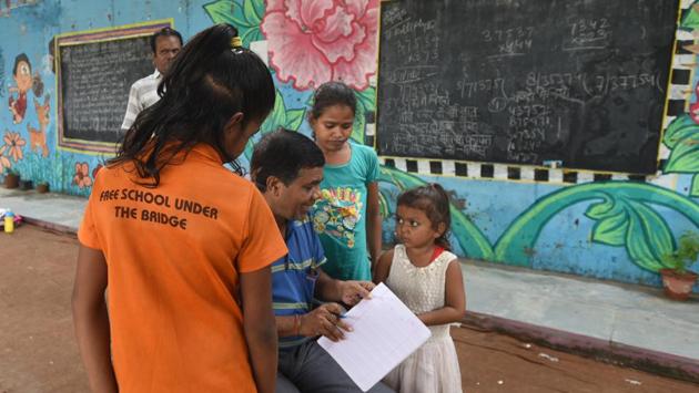 Among Kumar’s students three students have also enrolled in graduation courses at Indira Gandhi Open University this year. Last year, 10 students from the school did diploma in pharmacy from the Delhi government’s department of training and technical education. Back at Kandpal’s classroom, in the last two years, around 100 students have secured admission in a government school in Mayur Vihar Pocket 4. (Sushil Kumar / HT Photo) Among Kumar’s students three students have also enrolled in graduation courses at Indira Gandhi Open University this year. Last year, 10 students from the school did diploma in pharmacy from the Delhi government’s department of training and technical education. Back at Kandpal’s classroom, in the last two years, around 100 students have secured admission in a government school in Mayur Vihar Pocket 4. (Sushil Kumar / HT Photo)