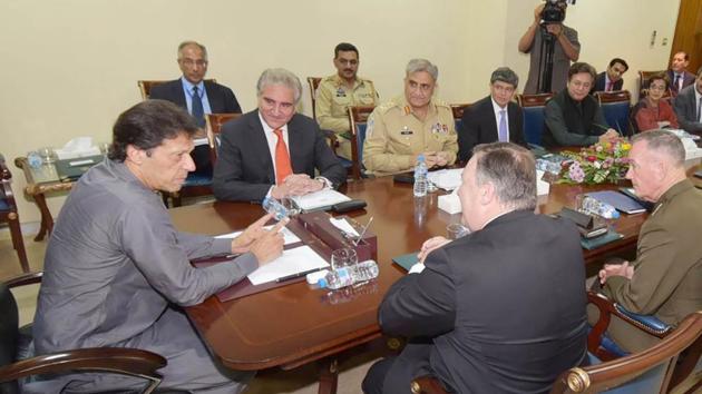 US Secretary of State Mike Pompeo (2R) and Pakistani foreign minister Shah Mahmood Qureshi (C/L) listen as Pakistani Prime Minister Imran Khan (L) speaks during a meeting at the Prime Minister's Office in Islamabad on September 5.(AFP Photo)