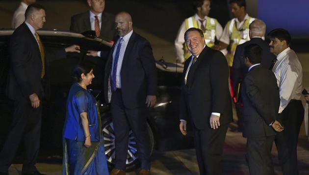 External affairs minister Sushma Swaraj greets US Secretary of State Mike Pompeo on his arrival at Palam Airforce Station, to attend first ever '2+2 Dialogue' between the two nations, in New Delhi on September 5.(AP Photo)