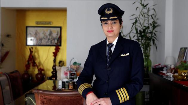 Shweta Singh, a Jet Airways pilot, poses for a picture inside her house in Gurugram on September 3, 2018.(REUTERS)