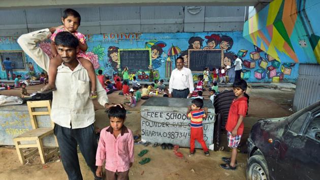 While preparing for their Teacher’s Day surprise at Kumar’s school, Subhash, who got admission in Class 7 at a government school last year said these are the best teachers they have ever had. And officials at the Mayur Vihar school said that students coming from Kandpal’s classroom are “smart”. Most of them know basic reading and mathematics making it easy for schools to enrol them. (Sushil Kumar / HT Photo) While preparing for their Teacher’s Day surprise at Kumar’s school, Subhash, who got admission in Class 7 at a government school last year said these are the best teachers they have ever had. And officials at the Mayur Vihar school said that students coming from Kandpal’s classroom are “smart”. Most of them know basic reading and mathematics making it easy for schools to enrol them. (Sushil Kumar / HT Photo)
