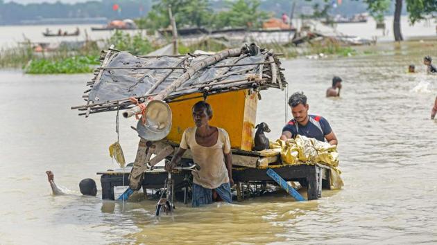 Three children died and hundreds of villages in five districts --Farrukhabad, Kannauj, Kanpur, Unnao and Fatehpur-- are facing flood situation as Ganga continued to rise amid heavy rain and release of water from Narora dam. While two kids were swept away in raging waters of Ganga in Unnao, one child died after his shanty collapsed in Fatehpur. (PTI File) Three children died and hundreds of villages in five districts --Farrukhabad, Kannauj, Kanpur, Unnao and Fatehpur-- are facing flood situation as Ganga continued to rise amid heavy rain and release of water from Narora dam. While two kids were swept away in raging waters of Ganga in Unnao, one child died after his shanty collapsed in Fatehpur. (PTI File)