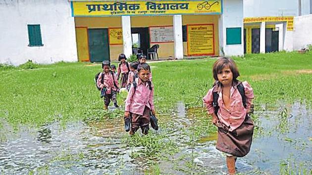 Students say the water is knee-deep and foul-smelling. They say a lot of insects are floating in it. (Sakib ali/HT Photo) Students say the water is knee-deep and foul-smelling. They say a lot of insects are floating in it. (Sakib ali/HT Photo)