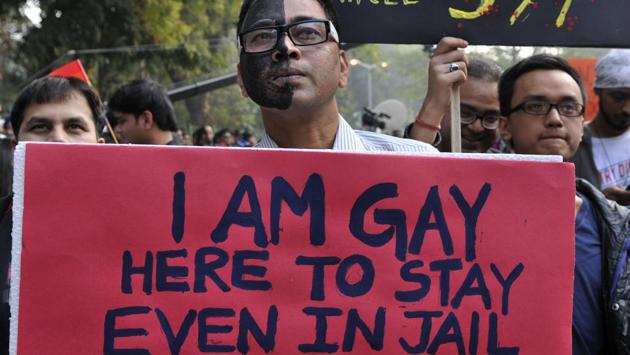 LGBT activists protest against Supreme Court's judgement on Section 377 at Jantar Mantar, in New Delhi on December 15, 2013. The 2009 judgement was challenged within a week in the Supreme Court, with the apex judicial body in upholding the in 2013. It left to the Parliament to “consider the desirability and propriety of deleting Section 377 IPC from the statute book or amend the same.” (Mohd Zakir / HT Archive)