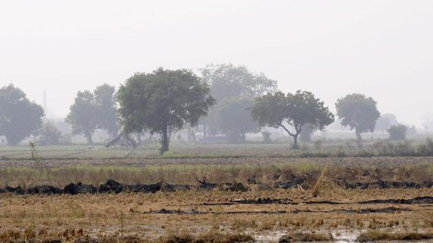 Land for the proposed international airport project at Jewar in Greater Noida on Monday. (Sunil Ghosh / HT Photo)