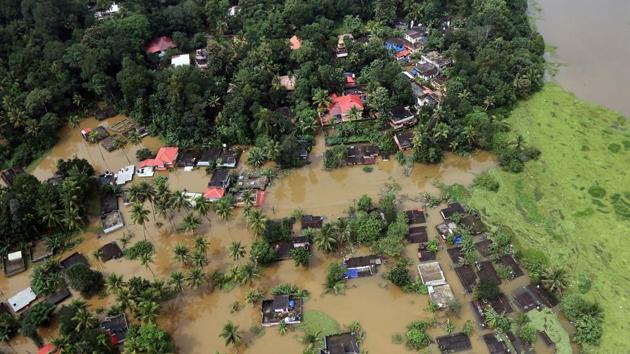 An aerial view shows partially submerged houses at a flooded area in the southern state of Kerala, India. (REUTERS File Photo) An aerial view shows partially submerged houses at a flooded area in the southern state of Kerala, India. (REUTERS File Photo)