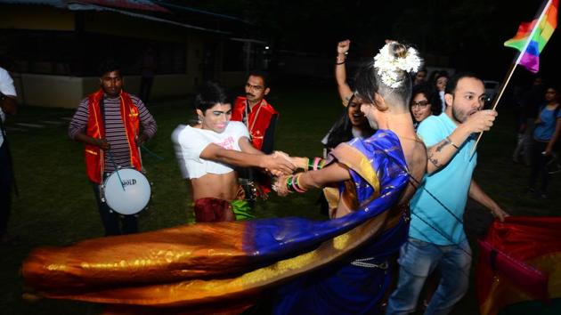 Members of the LGBT community celebrate after the Supreme Court verdict.(Shankar Narayan/HT Photo)