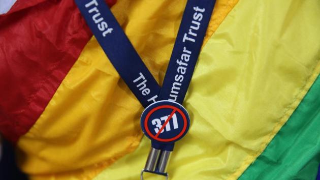 An activist wears a badge protesting against Section 377 of the India Penal Code (IPC) in Mumbai on September 6, 2018.(AP)