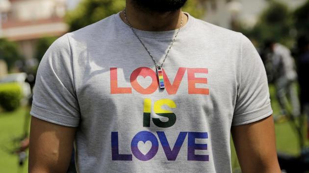 A gay rights activist outside the Supreme Court before the judgement on Section 377 of the Indian Penal Code, that criminalizes homosexuality, is delivered, in New Delhi on September 6, 2018.(AP)