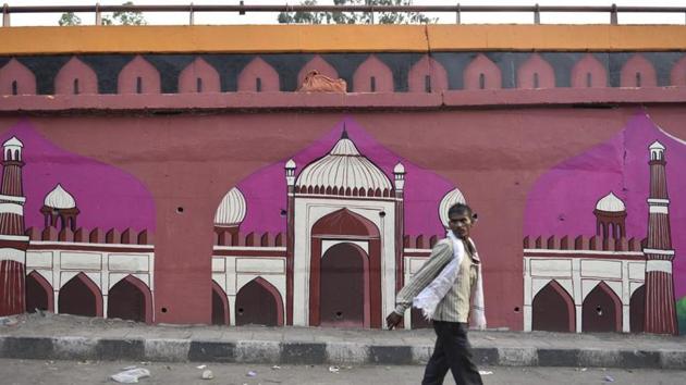 A general view of the makeover of a flyover by artists of "Delhi Street" with Paintings at Hanuman Temple, Yamuna Bazar in New Delhi. Neighbouring Gurugram, on the other hand, there is very little street or public art.(Sanchit Khanna/HT PHOTO)