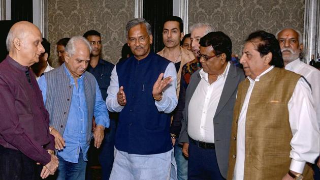 Uttarakhand chief minister Trivendra Singh Rawat meets filmmakers in Mumbai.(PTI photo)