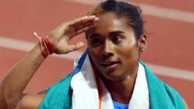 Hima Das celebrates after securing silver medal in the women's 400m final on athletics track event at the 18th Asian Games 2018 in Jakarta, August 26. Despite the Asian Games success of Swapna Barman, Hima Das, Harshita Tomar and Dutee Chand, the sight of girls playing a sport is rare anywhere(PTI)