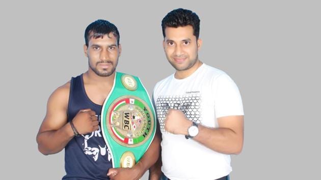 Indian boxer Rajesh Kasana with Jai Singh Shekhawat
