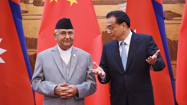 Nepal's Prime Minister K.P. Sharma Oli (L) chats with Chinese Premier Li Keqiang during a signing ceremony at the Great Hall of the People in Beijing on June 21, 2018. (AFP Photo) Nepal's Prime Minister K.P. Sharma Oli (L) chats with Chinese Premier Li Keqiang during a signing ceremony at the Great Hall of the People in Beijing on June 21, 2018. (AFP Photo)