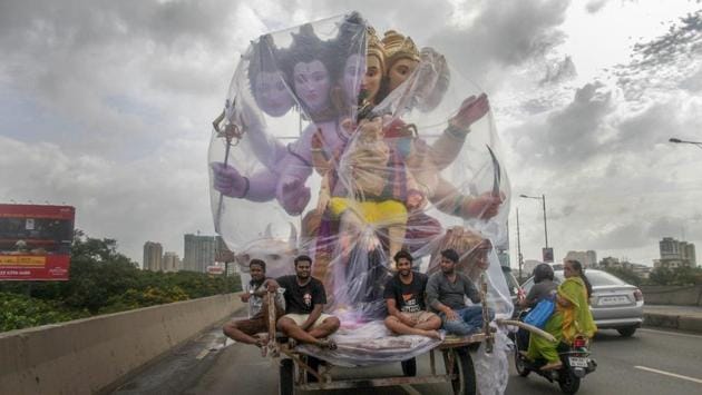 An idol of Hindu god Ganesha is carried for installation at a pandal ahead Ganesh Chaturthi festival, in Mumbai, Maharashtra. (PTI) An idol of Hindu god Ganesha is carried for installation at a pandal ahead Ganesh Chaturthi festival, in Mumbai, Maharashtra. (PTI)
