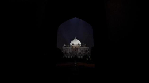 The grand white marble dome of Humayun’s Tomb in New Delhi shines bright, mimicking a moonlight effect at the 16th-century mausoleum. With energy-efficient lamps installed, the dome will now remain lit up for five hours after sunset every day, all year round. (Amal KS / HT Photo) The grand white marble dome of Humayun’s Tomb in New Delhi shines bright, mimicking a moonlight effect at the 16th-century mausoleum. With energy-efficient lamps installed, the dome will now remain lit up for five hours after sunset every day, all year round. (Amal KS / HT Photo)