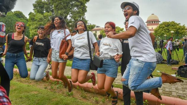 People react after the Supreme Court verdict which decriminalised homosexuality, outside the Supreme Court in New Delhi. (Kamal Kishore / PTI) People react after the Supreme Court verdict which decriminalised homosexuality, outside the Supreme Court in New Delhi. (Kamal Kishore / PTI)