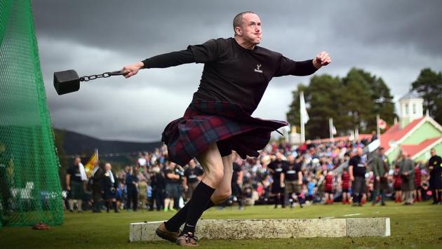A competitor takes part in the Hammer Throw event at the annual Braemar Gathering in Braemar, central Scotland. The Braemar Gathering is a traditional Scottish Highland Games which predates the 1745 Uprising, and since 1848 it has been regularly attended by the reigning Monarch and members of the Royal Family. (Andy Buchanan / AFP) A competitor takes part in the Hammer Throw event at the annual Braemar Gathering in Braemar, central Scotland. The Braemar Gathering is a traditional Scottish Highland Games which predates the 1745 Uprising, and since 1848 it has been regularly attended by the reigning Monarch and members of the Royal Family. (Andy Buchanan / AFP)