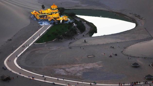An aerial view of Crescent Lake in Dunhuang in China’s northwestern Gansu province. (AFP) An aerial view of Crescent Lake in Dunhuang in China’s northwestern Gansu province. (AFP)