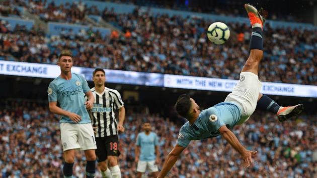 Manchester City’s Argentinian striker Sergio Aguero attempts an overhead kick during the English Premier League football match between Manchester City and Newcastle United at the Etihad Stadium in Manchester, north west England. (Oli Scarff / AFP) Manchester City’s Argentinian striker Sergio Aguero attempts an overhead kick during the English Premier League football match between Manchester City and Newcastle United at the Etihad Stadium in Manchester, north west England. (Oli Scarff / AFP)