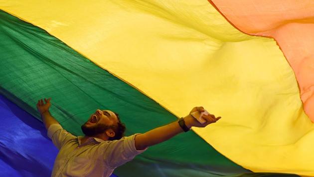 A member of the LGBT community celebrates the Supreme Court decision to strike down a colonial-era ban on gay sex, in Mumbai, Maharashtra. (Indranil Mukherjee / AFP) A member of the LGBT community celebrates the Supreme Court decision to strike down a colonial-era ban on gay sex, in Mumbai, Maharashtra. (Indranil Mukherjee / AFP)