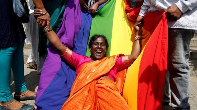 An LGBT activist celebrates after the Supreme Court's verdict of decriminalizing homosexuality and revoking the Section 377 law, in Bengaluru, Karnataka. (Abhishek N. Chinnappa / REUTERS) An LGBT activist celebrates after the Supreme Court's verdict of decriminalizing homosexuality and revoking the Section 377 law, in Bengaluru, Karnataka. (Abhishek N. Chinnappa / REUTERS)
