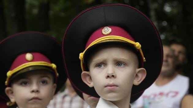 Young cadets attend a ceremony on the occasion of the first day of school at a cadet lyceum in Kiev, Ukraine. Ukraine marks Knowledge Day, as a traditional launch of the academic year. (Efrem Lukatsky / AP) Young cadets attend a ceremony on the occasion of the first day of school at a cadet lyceum in Kiev, Ukraine. Ukraine marks Knowledge Day, as a traditional launch of the academic year. (Efrem Lukatsky / AP)