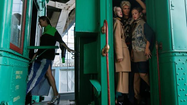 Models wait for a presentation of the creations by Ukrainian designer Jean Gritsfeldt during Ukrainian Fashion Week at the railway station in Kiev, Ukraine. (Valentyn Ogirenko / REUTERS) Models wait for a presentation of the creations by Ukrainian designer Jean Gritsfeldt during Ukrainian Fashion Week at the railway station in Kiev, Ukraine. (Valentyn Ogirenko / REUTERS)
