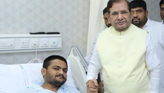 Patidar leader Hardik Patel with Loktantrik Janata Dal leader Sharad Yadav at a hospital in Ahmedabad on September 8. (Twitter/Hardik Patel) Patidar leader Hardik Patel with Loktantrik Janata Dal leader Sharad Yadav at a hospital in Ahmedabad on September 8. (Twitter/Hardik Patel)
