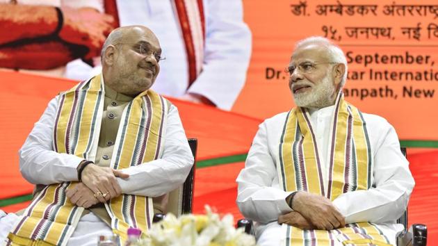 Prime Minister Narendra Modi with BJP national president Amit Shah during the BJP national executive committee meeting at Dr Ambedkar International Centre in New Delhi on September 8.(Sonu Mehta/HT PHOTO)