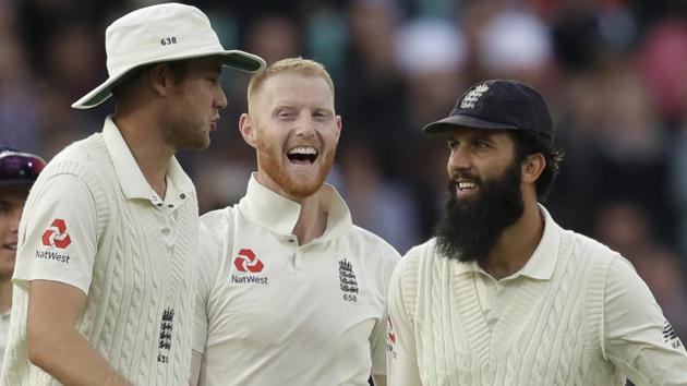 England's Ben Stokes, center, celebrates taking the wicket of India wicketkeeper Rishabh Pant at the Oval.(AP)