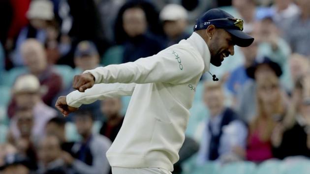 India's Shikhar Dhawan dances in front of India fans during the fifth cricket test match of a five match series between England and India at the Oval.(AP)