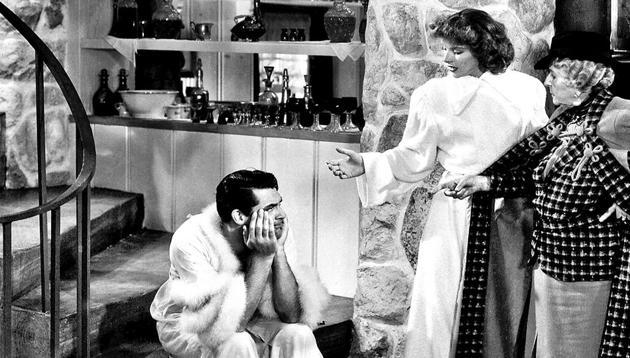 Cary Grant and Katharine Hepburn in the 1938 film Bringing Up Baby, where Grant used the word ‘gay’ on screen. Opinion is divided though, on whether he used it to mean homosexual or happy and cheerful.(Alamy Stock Photo)