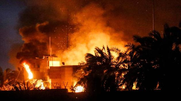 The burning headquarters of the Iranian consulate in the southern Iraqi city of Basra which was torched by protesters during demonstrations over poor public services, after parliament called for an emergency session on the unrest. (AFP Photo) The burning headquarters of the Iranian consulate in the southern Iraqi city of Basra which was torched by protesters during demonstrations over poor public services, after parliament called for an emergency session on the unrest. (AFP Photo)