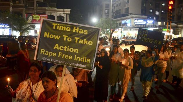 Candle light march to demand justice for Kathua and Unnao Rape Case victims organised by various social originations at RF Naik Chowk Kopar Khairane in Navi Mumbai on April 18. (HT Photo) Candle light march to demand justice for Kathua and Unnao Rape Case victims organised by various social originations at RF Naik Chowk Kopar Khairane in Navi Mumbai on April 18. (HT Photo)