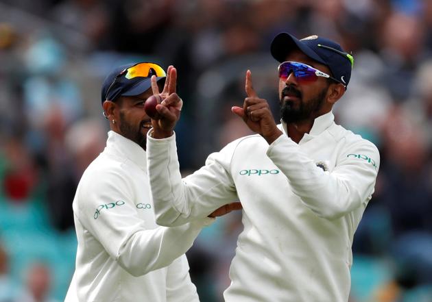Lokesh Rahul celebrates after taking a stunning catch to dismiss Stuart Broad during the second day of the fifth test match between England and India at the Oval cricket ground. (REUTERS)