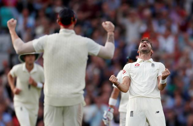 James Anderson celebrates taking the wicket of India's Cheteshwar Pujara during the second day of the fifth test match between England and India at the Oval cricket ground. (REUTERS)