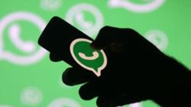 A man poses with a smartphone in front of displayed Whatsapp logo in this illustration.(Reuters File Photo) A man poses with a smartphone in front of displayed Whatsapp logo in this illustration.(Reuters File Photo)