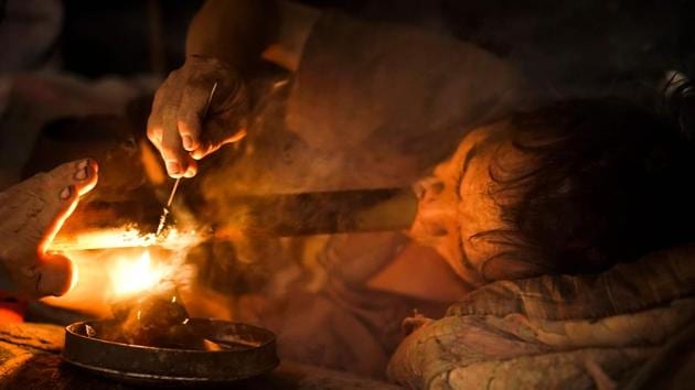 Hmong tribesman Vo Pali taking a puff of opium at his village in Houaphan province, northern Laos. (AFP Photo) Hmong tribesman Vo Pali taking a puff of opium at his village in Houaphan province, northern Laos. (AFP Photo)
