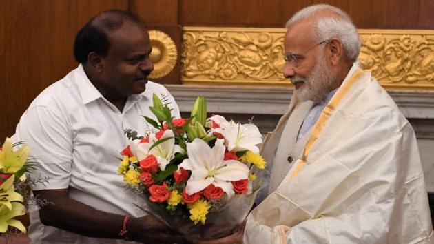 A high-level delegation, led by Karnataka chief minister HD Kumaraswamy, met Prime Minister Narendra Modi on Monday and requested him to convene a meeting to resolve various issues raised by Tamil Nadu over a Rs 5,912-crore reservoir to be built on the Cauvery river in Mekedatu. The delegation also apprised the Prime Minister about the impact on the recent flood on seven districts of Karnataka and sought relief fund. (ANI) A high-level delegation, led by Karnataka chief minister HD Kumaraswamy, met Prime Minister Narendra Modi on Monday and requested him to convene a meeting to resolve various issues raised by Tamil Nadu over a Rs 5,912-crore reservoir to be built on the Cauvery river in Mekedatu. The delegation also apprised the Prime Minister about the impact on the recent flood on seven districts of Karnataka and sought relief fund. (ANI)