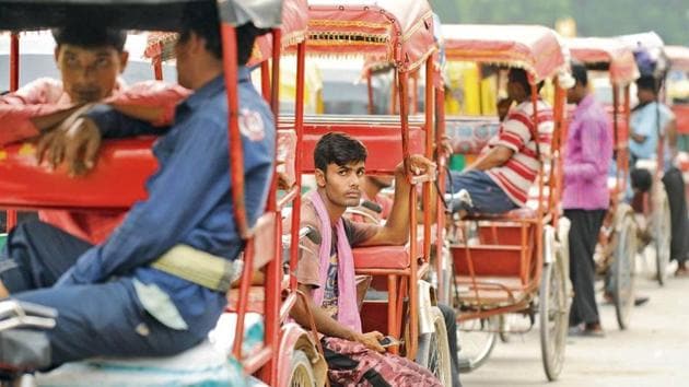 Experts estimate that the number of cycle rickshaws, which were earlier around 10,000, are now below 1,000.(HT Photo)