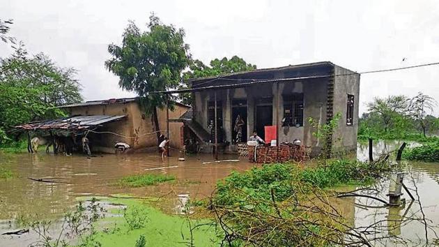 Rainwater enters a house in Itawa region of Kota division.(HT Photo)