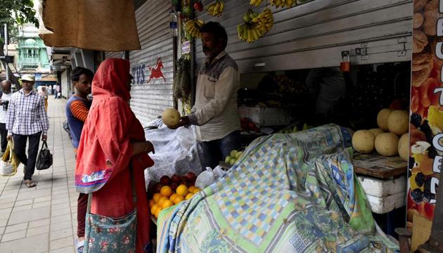 Shops were partially opened during the Bharat bandh protest at Byculla east in Mumbai, on Monday.(Anshuman Poyrekar/HT Photo) Shops were partially opened during the Bharat bandh protest at Byculla east in Mumbai, on Monday.(Anshuman Poyrekar/HT Photo)
