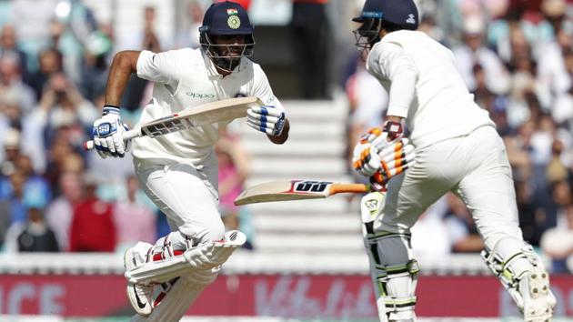 India's Hanuma Vihari (L) and India's Ravindra Jadeja take a run during play on the third day of the fifth Test cricket match between England and India at The Oval. (AFP)