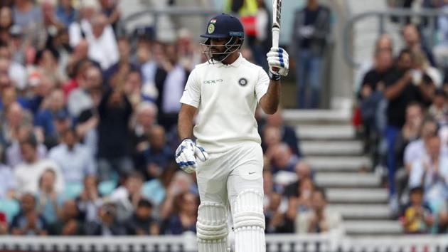 India's Hanuma Vihari acknowledges the applause after reaching his fifty during play on the third day of the fifth Test cricket match. (AFP)