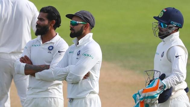 Ravindra Jadeja and Virat Kohli wait for the decision of the third umpire after reviewing a decision during day three of the 5th Test at the Oval on Sunday. (Getty Images) Ravindra Jadeja and Virat Kohli wait for the decision of the third umpire after reviewing a decision during day three of the 5th Test at the Oval on Sunday. (Getty Images)