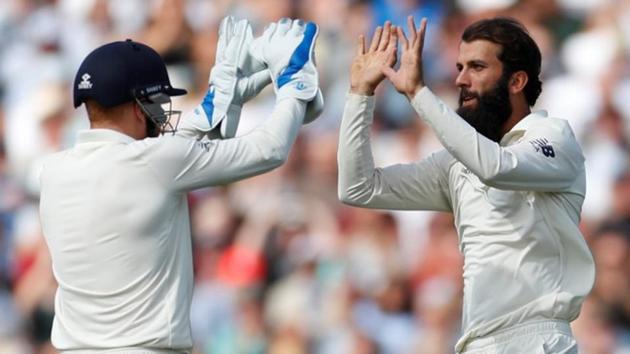 Moeen Ali celebrates with Jonny Bairstow the wicket of India's Hanuma Vihari. (REUTERS)